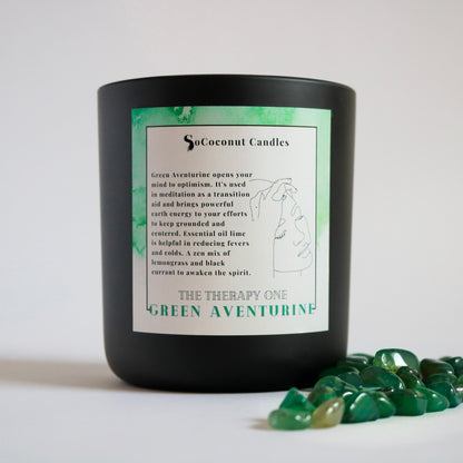 Alt: The Therapy One candle—lime, jasmine, powder, lemongrass essential oil, adorned with aventurine. Illuminate with a zen mix of lemongrass and black currant. 🌿🕯️✨